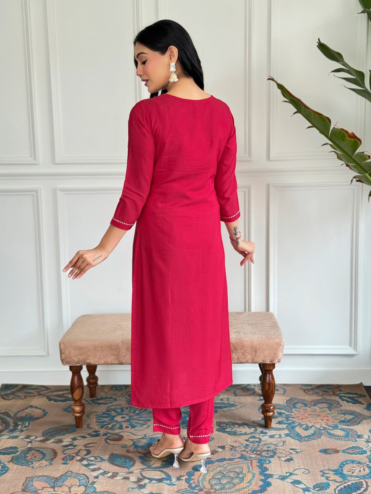 Back view of the red rayon kurta and matching pant