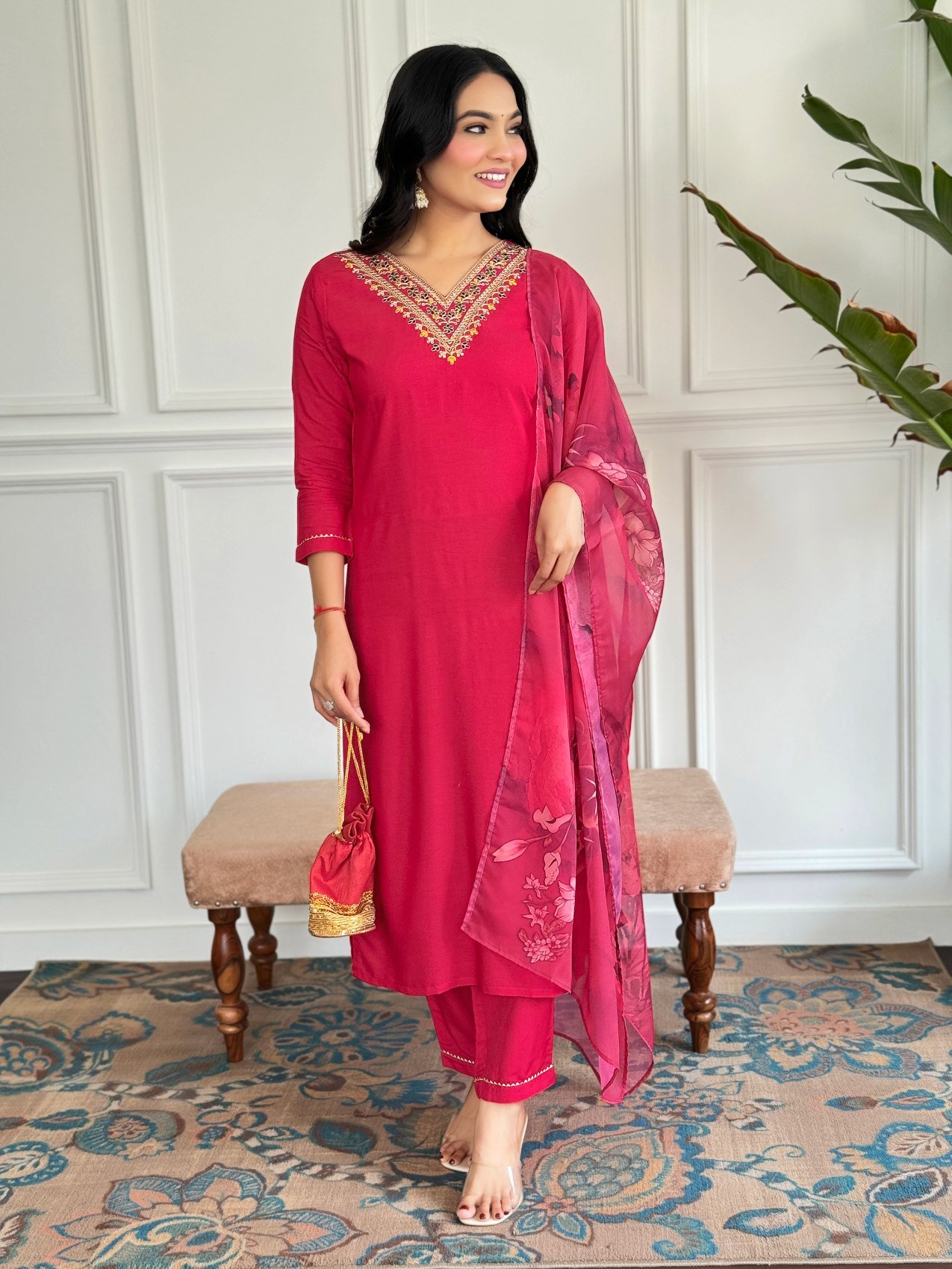 Side view of the red kurta set with printed dupatta
