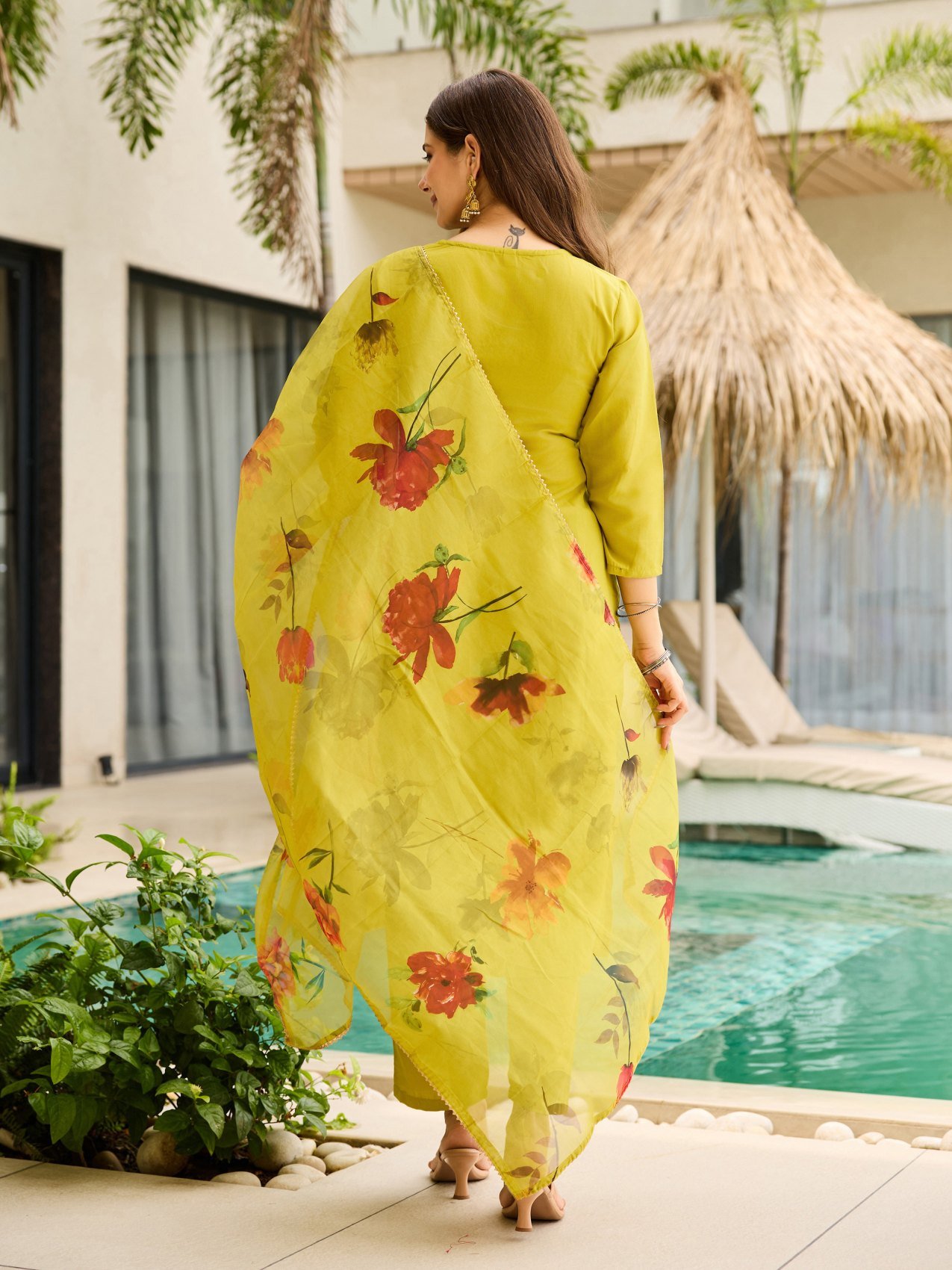 Back view of the lime green rayon kurta with pant and dupatta
