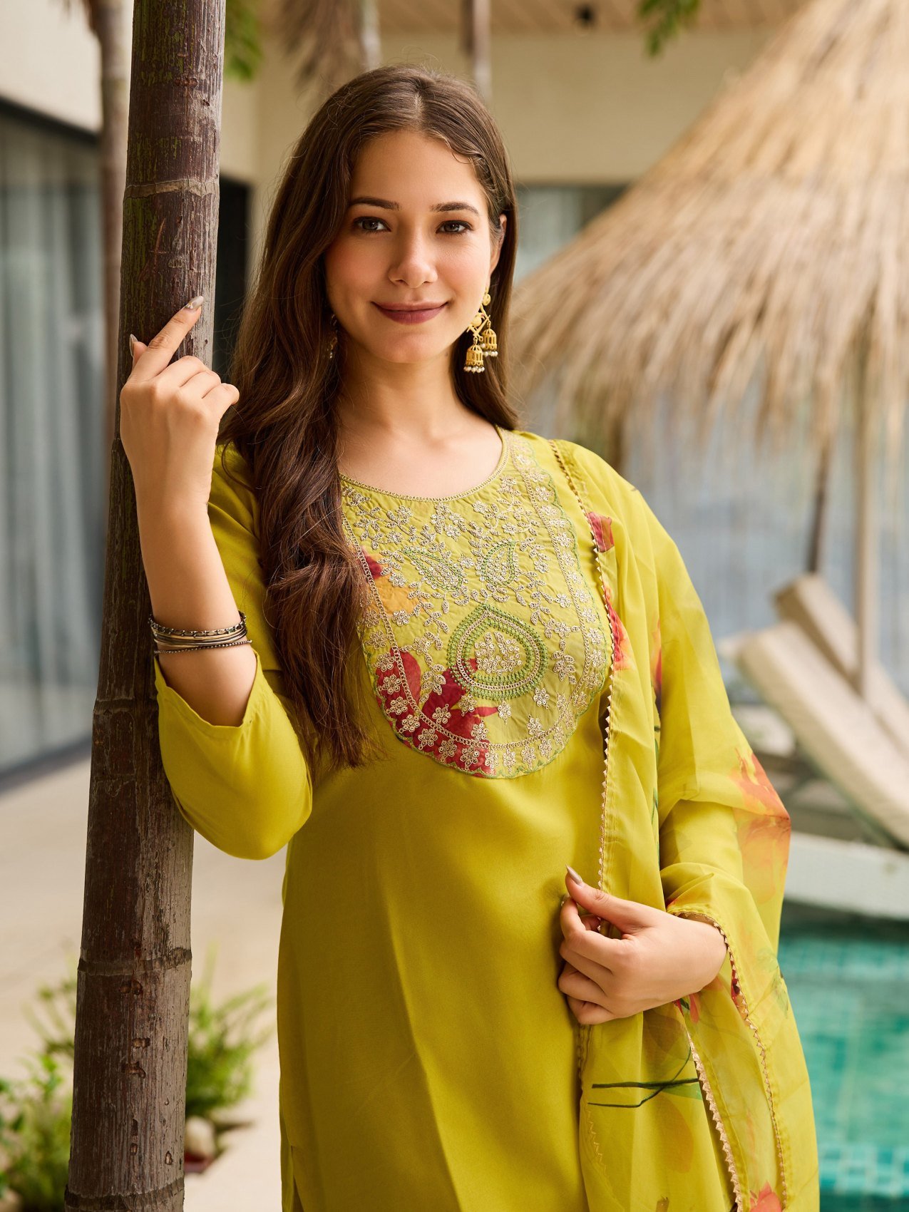 Lime green kurta set styled with the printed dupatta, upper body view