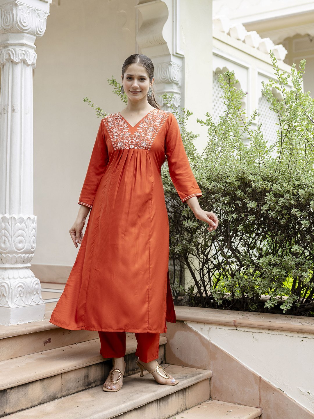 Full-length front view of the rust kurta with matching pant