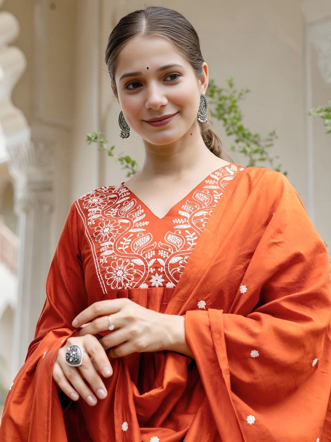 Rust kurta set styled with the Chanderi dupatta, upper body view