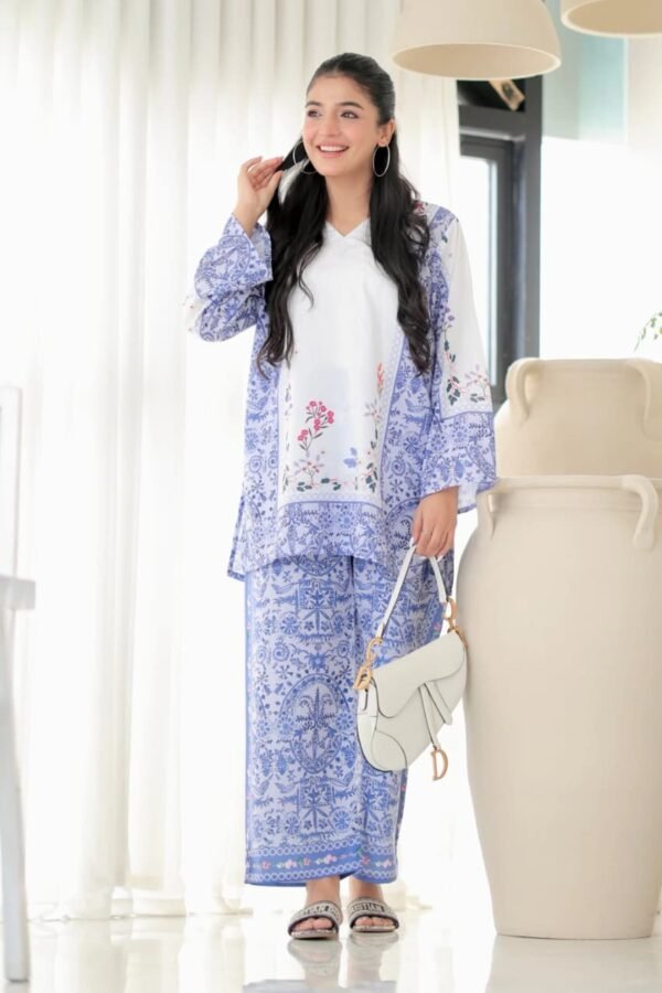 Blue and white floral print rayon co-ord set with shrug, inner top and pant, front view