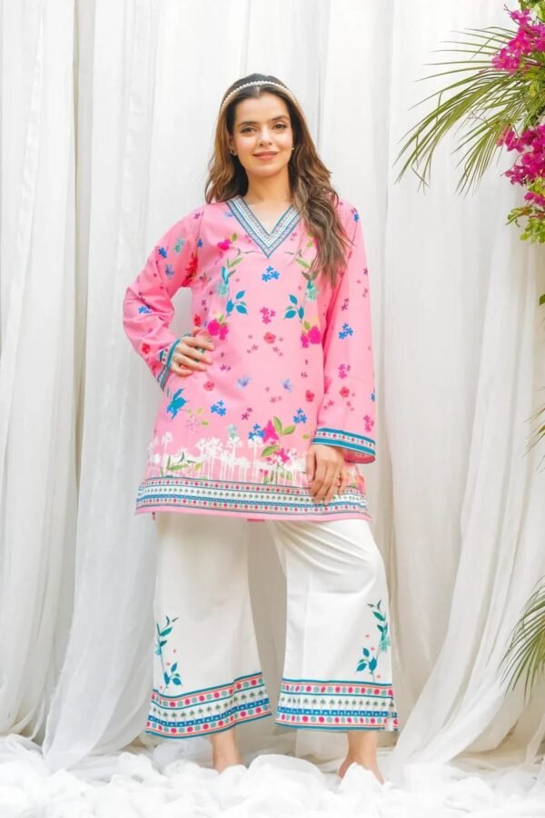 Pink floral print rayon kurti with cream pant, front view