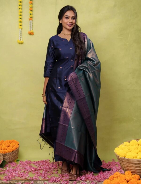 Model wearing the blue woven art silk kurta, pant & dupatta set, front view