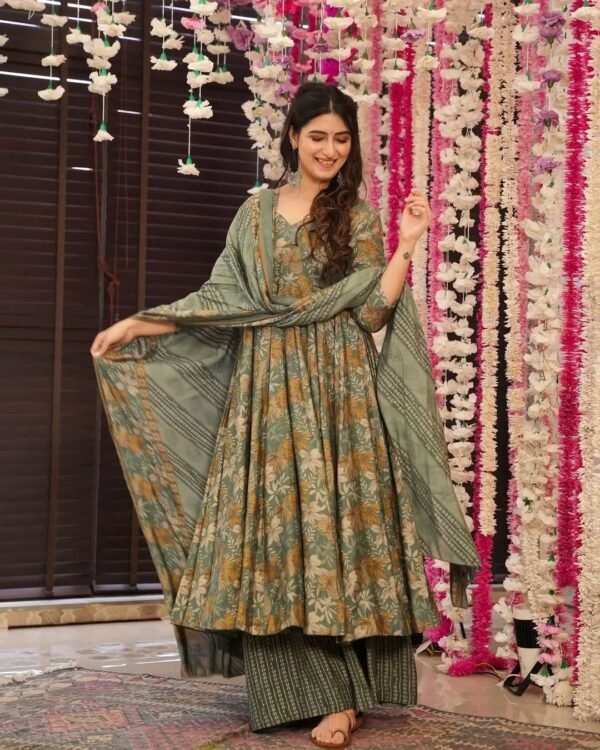 Model wearing the green printed rayon slub Anarkali, pant & Chanderi dupatta set, front view