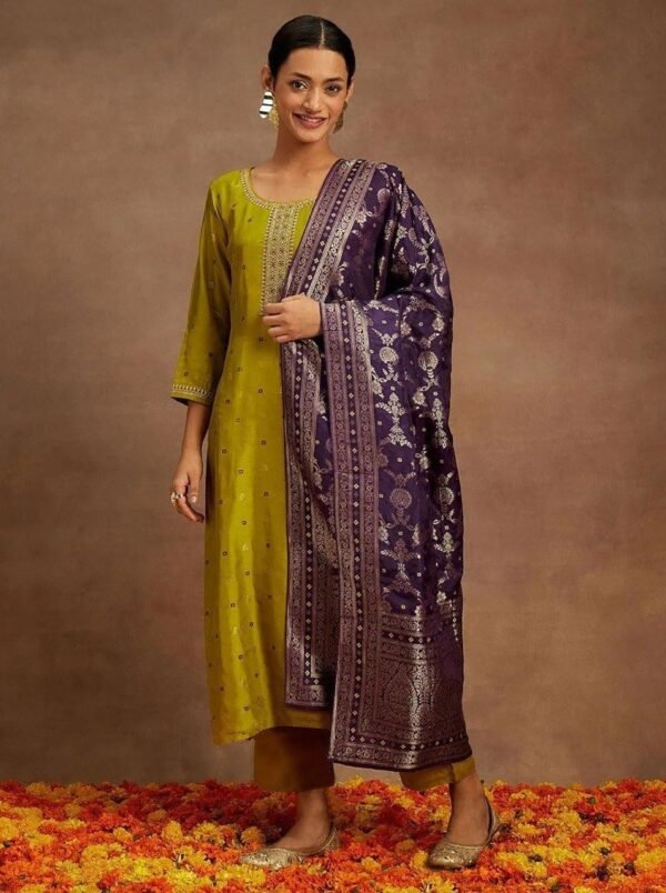Model wearing the mustard woven art silk kurta, pant & dupatta set, front view