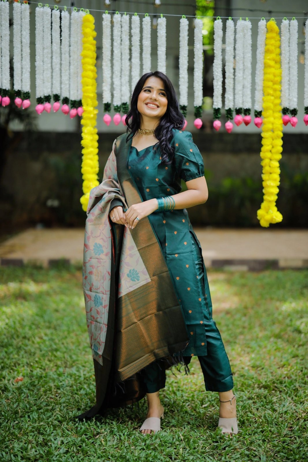 Model wearing the cerulean woven jacquard kurta, pant & dupatta set, front view