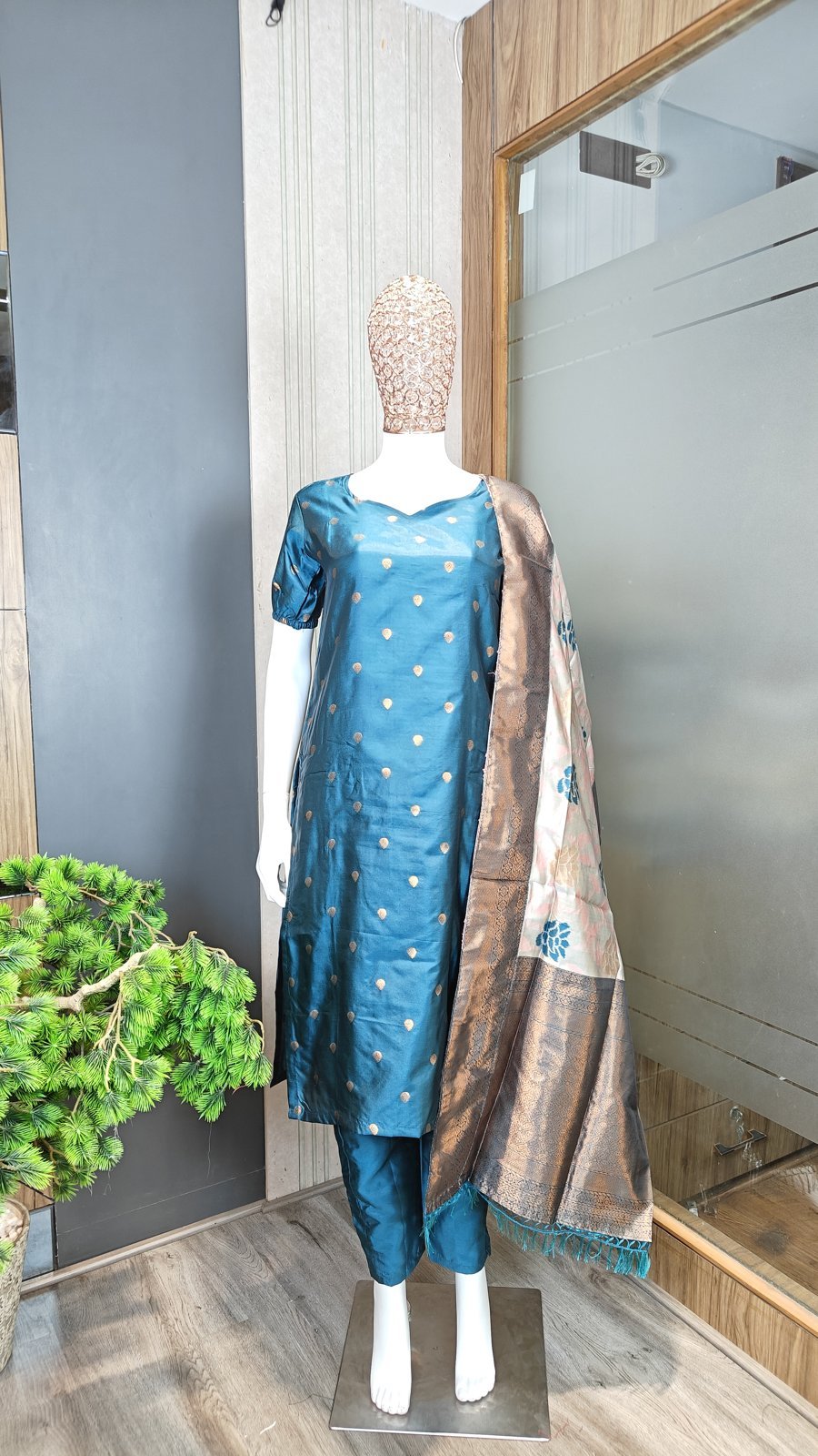 Cerulean woven jacquard kurta, pant & dupatta set displayed on a mannequin
