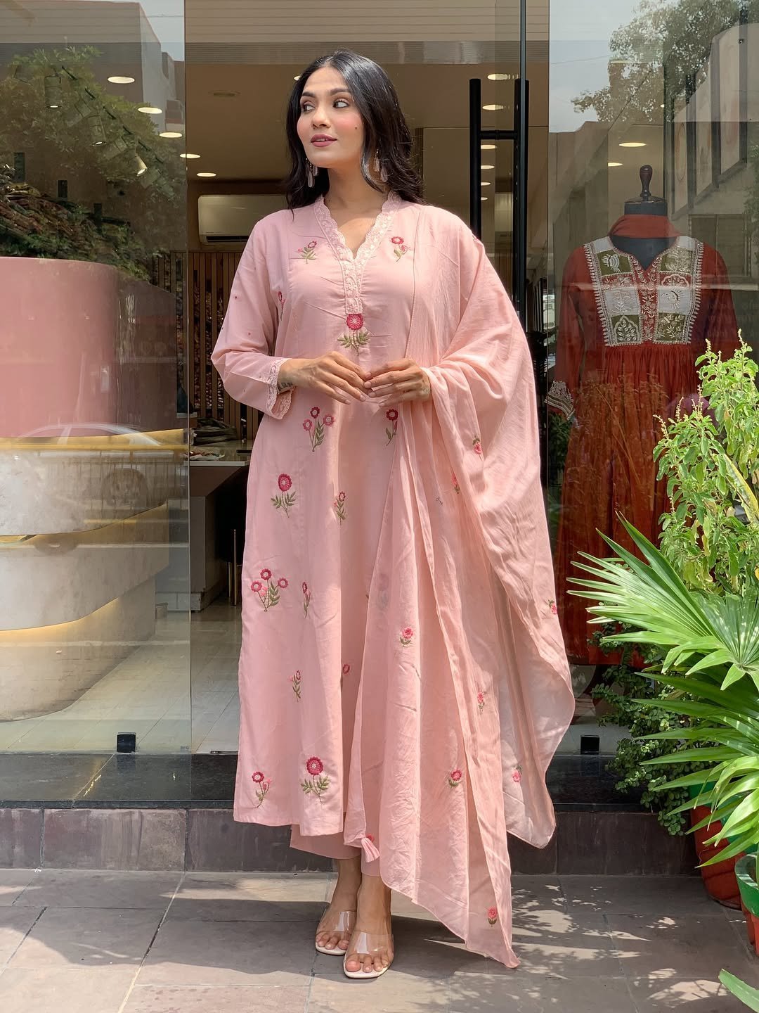 Side view of the peach embroidered Chanderi kurta set