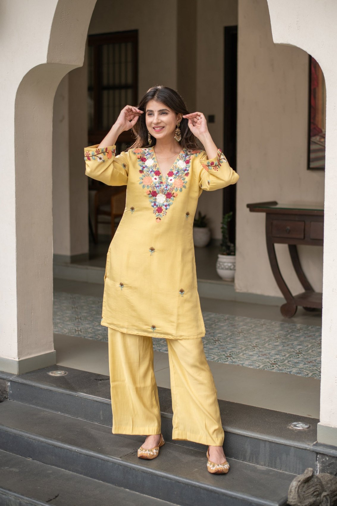 Yellow embroidered French crepe kurti with matching pant, front view
