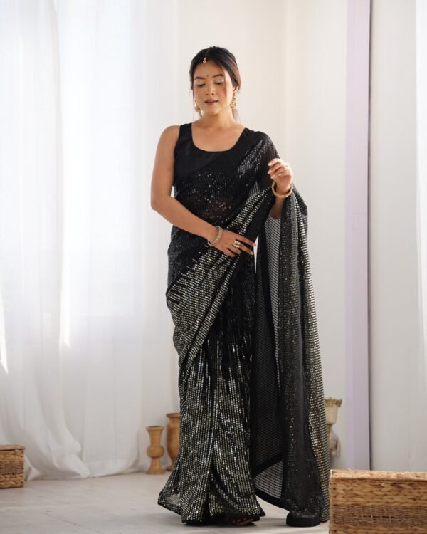 Black sequin embroidered heavy georgette saree with unstitched blouse, draped front view