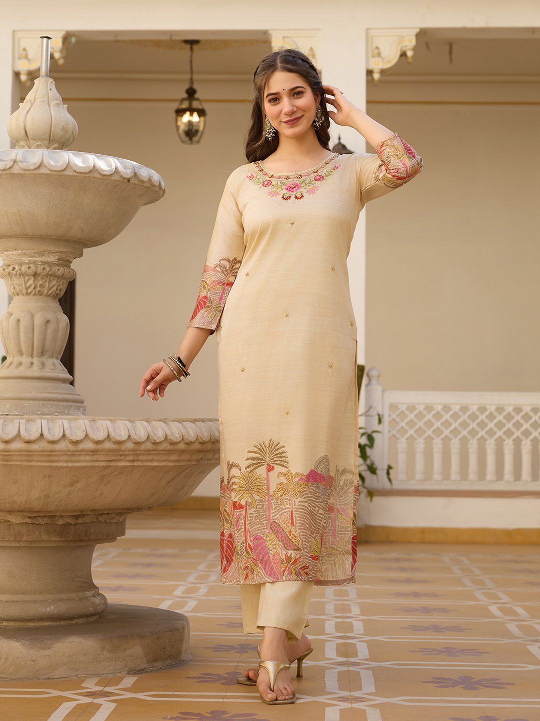Front view of the beige kurta with printed hem border