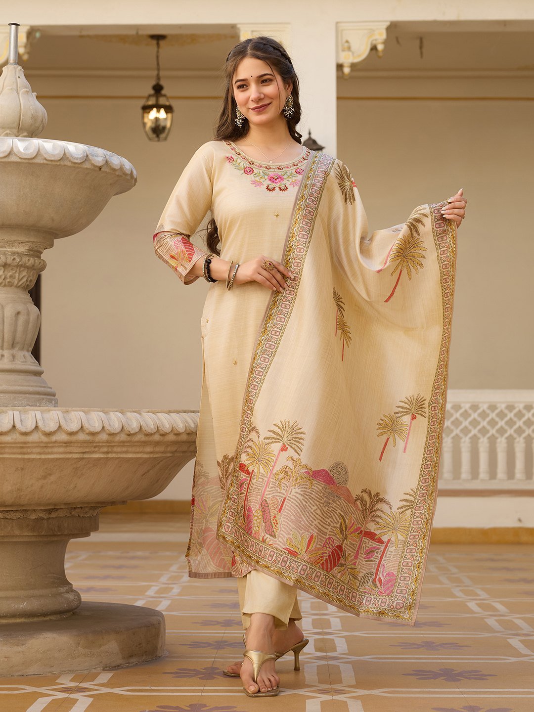 Side view of the beige kurta set with dupatta