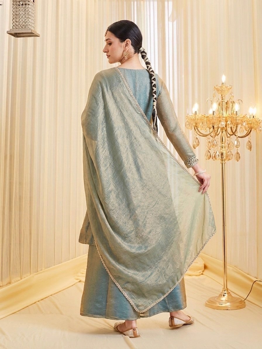 Back view of the teal kurta set showing the shimmer Fandy silk dupatta